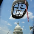 The finished North cast bronze fountain after the conservation and restoration treatment is being lowered in place on site of the U S Capitol grounds