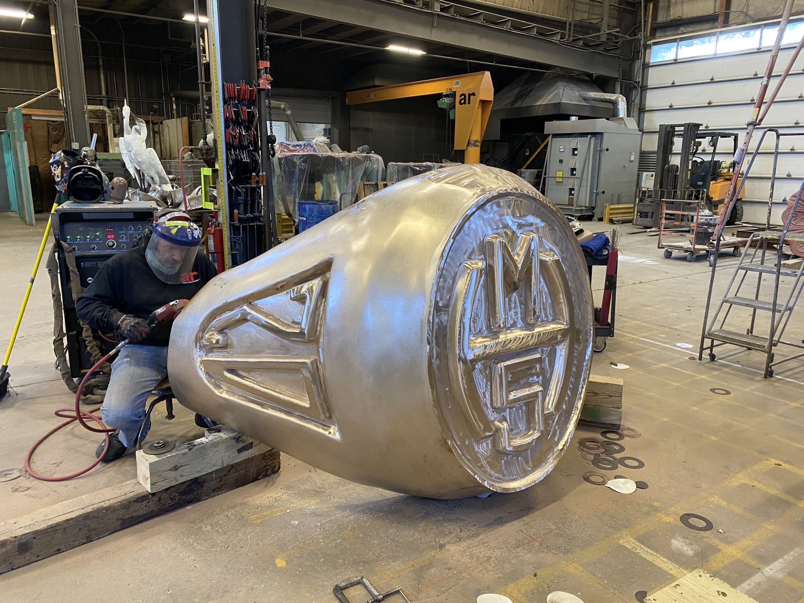 metal finishing and chasing a bronze sculpture