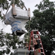 The ART installation crew is lowering the restored cast Chinese bronze lanterns and performing a dry run to make certain that all anchoring systems in stainless steel fit as a glove.