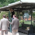 Trolley Transom on the US Capitol Grounds before conservation and restoration treatment. In the photo on the left is United States Senator Arlen Specter from Pennsylvania walking past the Trolley Transom as it is being tagged and documented before removing to our 30 thousand sq. ft. facility in Lancaster Pa.  The treatment will include a newly fabricated steel roof along with other fabricated elements