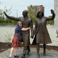 Catherine Moylan Mini poses with the Obama sculpture. Provided by Michael Mini